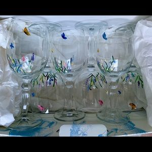 Set of six hand painted butterfly wine glasses.